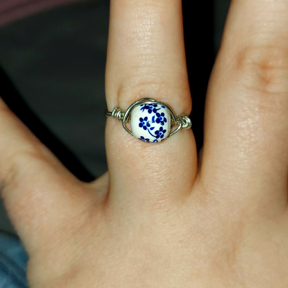 blue and white floral pattern ring